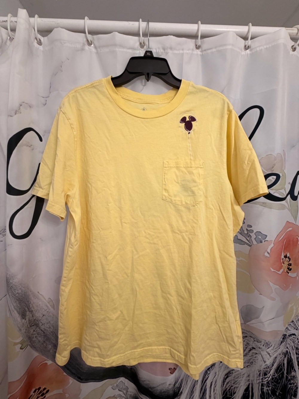 Disney Men's Pale Yellow Short Sleeve Pocket Tee with Small Burgundy Graphic